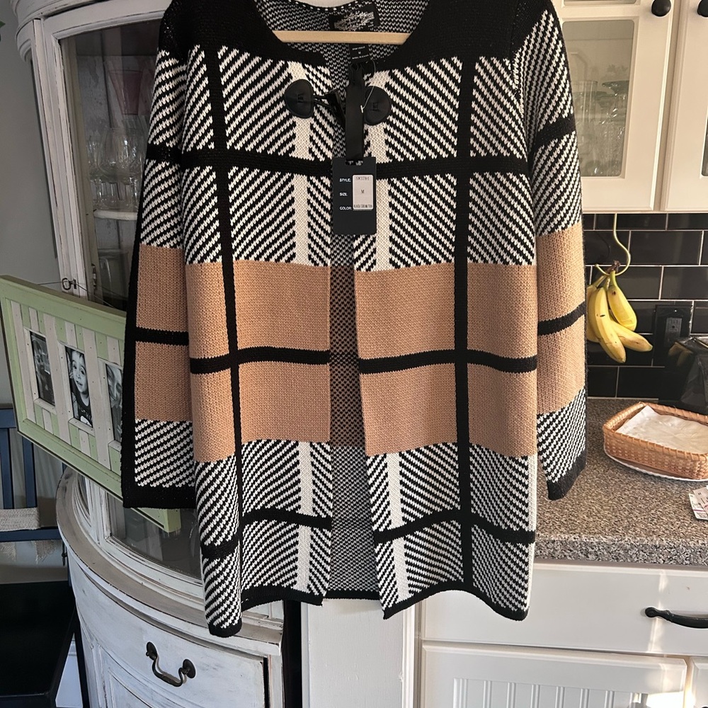 Stylish Black Tan Women's Sweater with top toggle closure.  Shoulder to hem 32”